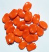 25 13x9mm Flat Oval Twisted Opaque Orange Beads