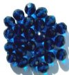 25 10mm Faceted Round Transparent Dark Aqua Firepolish Beads