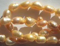 FWP 16inch Strand of 7mm Light Gold Oval Pearls