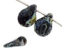 69, 5x7mm Opaque Black Travertine Pip Beads