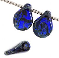 69, 5x7mm Transparent Dark Blue Travertine Pip Beads