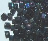 10 grams of 4x4mm Opaque Rainbow Black Miyuki Cubes