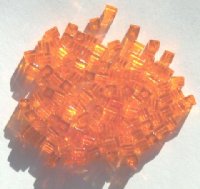 10 grams of 4x4mm Transparent Orange Miyuki Cubes