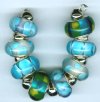 Strand of 8 13x9 Pandora Style Lampwork Beads -  Aqua Mix