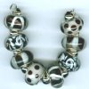 Strand of 8 13x9 Pandora Style Lampwork Beads -  Dark Topaz Mix