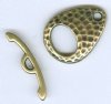 1 22x16mm TierraCast Hammered Brass Oxide Ellipse Toggle