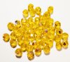 50, 6mm Faceted Transparent Yellow AB Firepolish Beads