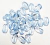 30, 11x8mm Transparent Light Sapphire Twisted Oval Beads
