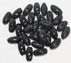 30, 13x7mm Opaque Black Ridged Oval Beads