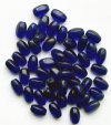 50 9x5mm Transparent Cobalt 6-Sided Oval Beads