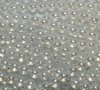 16 inch strand of 6mm Luminescent White Round Glass Pearl Beads