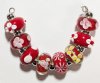 Strand of 8 13x9 Pandora Style Lampwork Beads - Red Mix