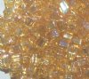 10 grams of 4x4mm Transparent Rainbow Tan Miyuki Cubes