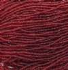 1 Hank of 10/0 Transparent Dark Red Seed Beads