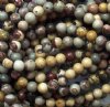 16 Inch Strand of 6mm Round Crazy Horse Stone Beads