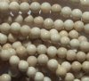 16 inch strand of 6mm Round River Stone Beads
