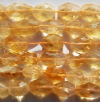 14 inch strand 7 to 12mm x 8 to 6mm Citrine Faceted Ovals