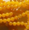 16 inch strand of 6mm Round Honey Jade Beads